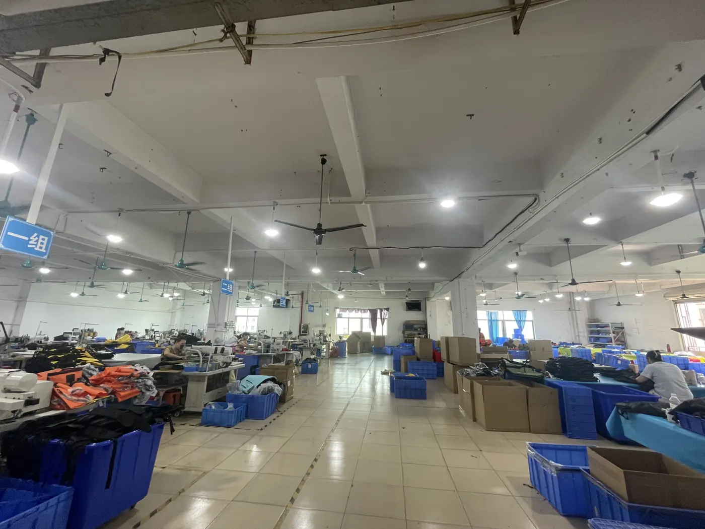 Workshop aisle and work areas at the Outdoorsbloom workshop in Dongguan